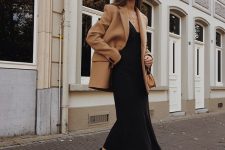 21 an elegant fall outfit for work with a black slip midi dress, a tan oversized blazer, black boots and a tan bag