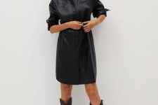 26 a super trendy fall outfit of a black leather shirtdress over the knee and black cowboy boots is amazing