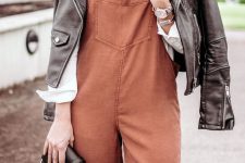 30 a white shirt, a rust overall, a black leather jacket, a black clutch and tassel earrings for a cute fall look