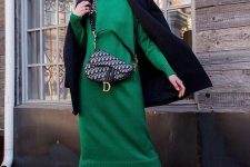37 a beautiful emerald sweater midi dress, a navy corduroy coast, white boots and a printed mini bag