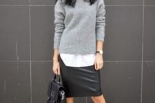 With black leather pencil skirt, black bag and black lace up flat boots