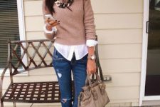 With distressed jeans, bag, black and white shoes, necklace and sunglasses