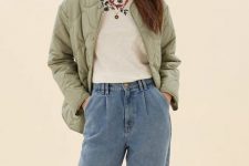 With floral printed shirt and light blue loose jeans