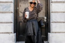 With leopard printed blouse, chain strap bag and beige shoes