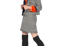 With red and golden blouse, printed tweed mini skirt and black over the knee boots