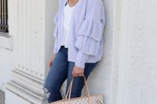 With white V-neck top, distressed jeans, beige suede ankle boots and printed tote bag