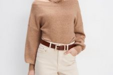 With white high-waisted trousers, golden necklace and brown leather belt