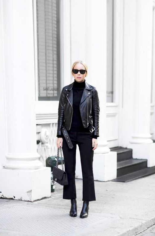a black turtleneck, flare trousers, boots, a leather jacket and a mini bag for a chic look every day