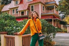a colorful fall look with green pants