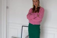 a color block feminine look with a pink cardigan, a green pencil midi, mustard shoes and statement earrings