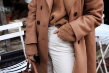a rust-colored fall outfit with a sweater, a midi coat, white jeans and a bag is a great idea for a cold fall day