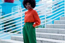 an orange turtleneck, emeral high waisted trousers and matching shoes for a super bright career look