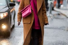 an oversized hot pink hoodie, black cropped jeans, white sneakers, a mustard coat and a hot pink bag for the fall