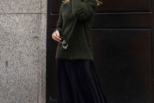05 a dark green sweater, a black slip midi, black hiking boots for a comfy and cool winter look