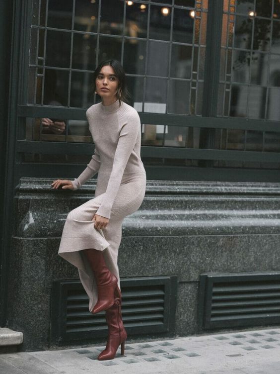 a simple and stylish outfit with a neutral knit midi dress, burgundy boots and earrings will work perfect for any date