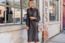 14 a classy winter look with a grey midi sweaterdress, neutral boots, a grey bag and a grey belt