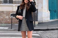 25 a preppy winter look with a striped tee, a printed mini skirt, a black blazer, a mini bag and green knee boots