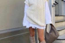 36 a chic winter outfit with a white mini shirtdress, a creamy chunky knit vest, tan knee boots and a taupe bag