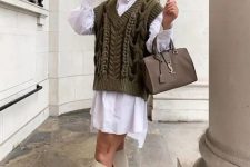 39 a white oversized shirtdress, an olive green knit vest, creamy boots and a grey bag are great for winter