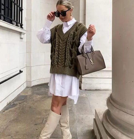 a white oversized shirtdress, an olive green knit vest, creamy boots and a grey bag are great for winter