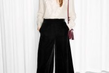 With beige blouse, black ankle strap shoes and marsala tassel bag