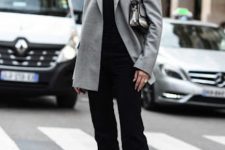 With black lace shirt, black cropped trousers, gray loose blazer and bag