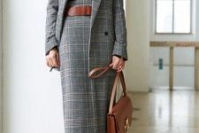 With checked high-waisted midi skirt, brown leather belt, brown leather bag and red suede high boots