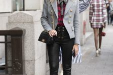 With checked shirt, black leather pants, gray blazer and black chain strap bag