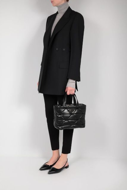 With gray turtleneck, black long blazer, cropped pants and black flat shoes