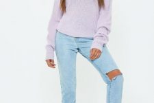 With light blue distressed cuffed jeans and white sneakers