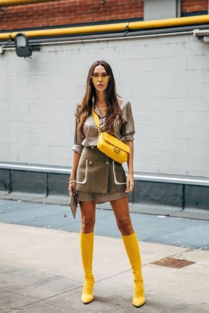 With long shirt, tweed skirt and yellow crossbody bag