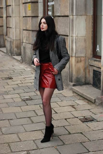 With red patent leather wrap mini skirt and black suede ankle boots