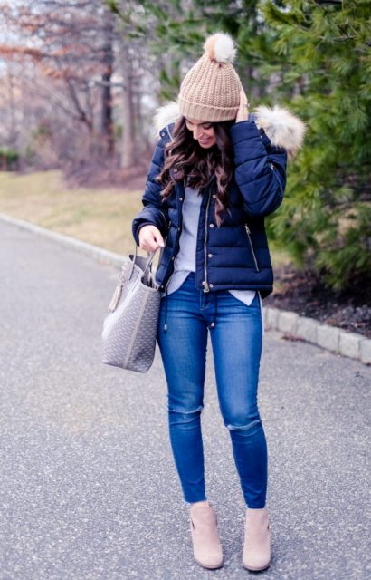 With shirt, distressed jeans, beige ankle boots, printed tote bag and beige pom pom hat