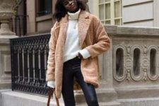 With turtleneck sweater, beige faux fur coat, leather pants and brown mini bag