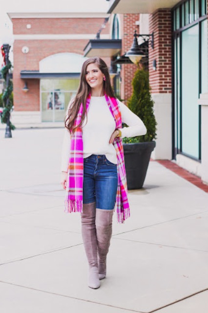 With white sweater, hot pink plaid scarf and jeans