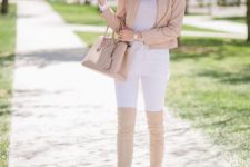 With white t-shirt, beige jacket, white skinny pants and beige bag