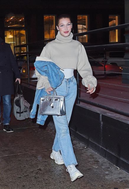 With white top, light blue jeans, denim jacket, silver leather bag and white sneakers