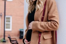 With black mini dress, brown coat and marsala leather bag