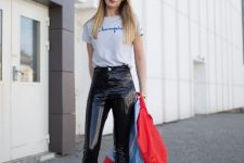 With labeled t-shirt, red and light blue bomber jacket and lace up cutout high heel boots