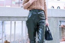 With light brown knitted sweater, navy blue leather bag and embellished flat mules