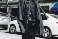 With printed scarf, crop top, black palazzo pants, black and gray lace up boots, chain strap bag and chain belt