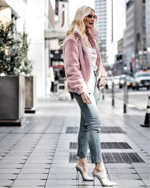 With white blouse, high waisted jeans and light gray high heeled mules