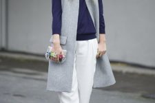 With white loose pants, embellished mini clutch and platform shoes