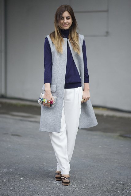 With white loose pants, embellished mini clutch and platform shoes