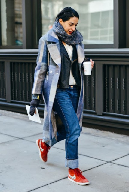 With white shirt, scarf, cuffed jeans and red sneakers