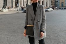 a black sweater, leggings, over the knee black boots, an oversized grey blazer and a chic and stylish black bag