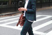a dark green tartan pantsuit, a white shirt, brown snakeskin flats, a brown bag for a chic and cool look on holidays