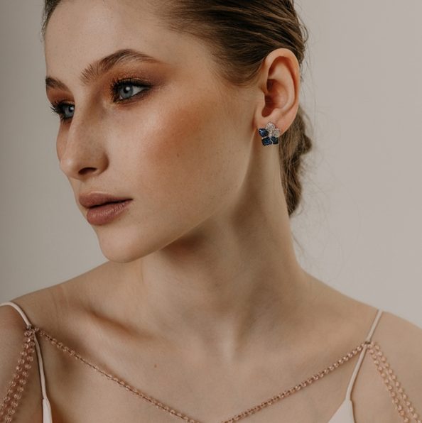 a jaw dropping party or special occasion look with beautiful two tone flower statement earrings that accent the eye color