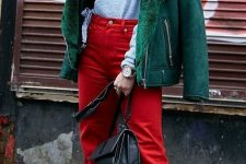 a light blue wrap jumper, red jeans and red flats, a green shearling coat and a black bag for a super bold look