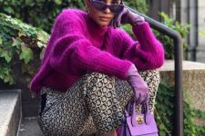 a lovely fuchsia chunky cropped sweater, printed trousers, fuchsia shoes and a purple bag for a statement